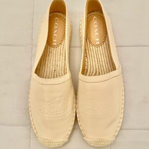 Brand new Coach leather espadrilles in off white. New without tags. Never worn